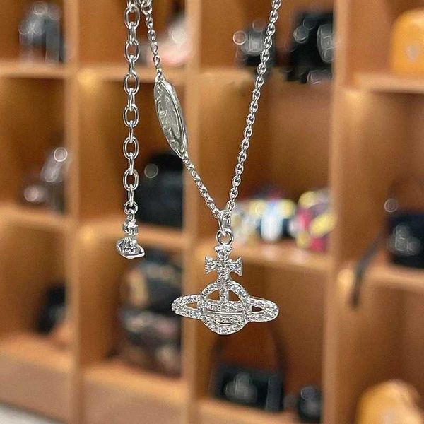 vivienne empress dowager of the west has full diamond hollowed out saturn necklace with female niche design and a classic planet pendant, Silver
vivienne empress dowager of the west has full diamond hollowed out saturn necklace with female niche design and a classic planet pendant, Silver