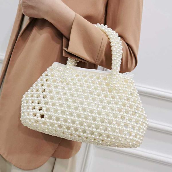 totes hand-woven crystal bag women's fashion retro acrylic pearl new handbag elegant versatile ladies bags 230530
totes hand-woven crystal bag women's fashion retro acrylic pearl new handbag elegant versatile ladies bags 230530
