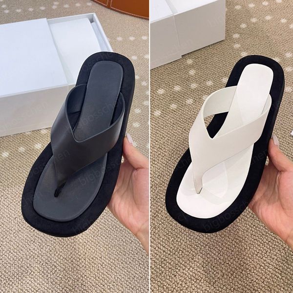 luxury designer flip-flops ladies beach shoes the row summer fashion thick bottom clip feet flip-flops black classic leather flat bottom out
luxury designer flip-flops ladies beach shoes the row summer fashion thick bottom clip feet flip-flops black classic leather flat bottom out