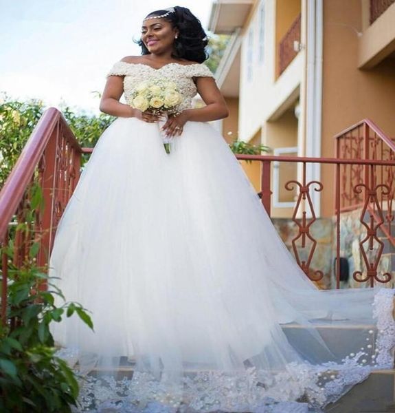 luxury pearls beaded wedding dress sweetheart off shoulder straps african bridal wedding gowns puffy tulle bride dress appliques9417435, White
luxury pearls beaded wedding dress sweetheart off shoulder straps african bridal wedding gowns puffy tulle bride dress appliques9417435, White