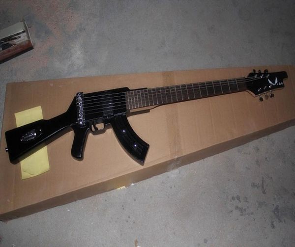 specialshaped gun electric guitar black memorial can be customized to change upon request5192952
specialshaped gun electric guitar black memorial can be customized to change upon request5192952