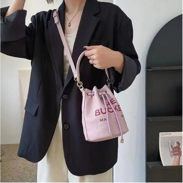 travel tote bag the marc bucket bag womens mens handbag luxury tote pull closure drawstring strap designer buckets handle satchel crossbody
travel tote bag the marc bucket bag womens mens handbag luxury tote pull closure drawstring strap designer buckets handle satchel crossbody