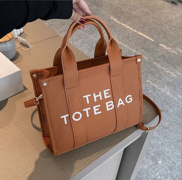 the designer tote bags 2023 new fashion ladies tote shopping bag marc handbag large capacity shoulder crossbody women pu leather canvas wall
the designer tote bags 2023 new fashion ladies tote shopping bag marc handbag large capacity shoulder crossbody women pu leather canvas wall