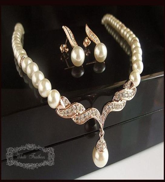 gold plated tear drop cream pearl and rhinestone crystal bridal necklace and earrings jewelry set8262425, Silver
gold plated tear drop cream pearl and rhinestone crystal bridal necklace and earrings jewelry set8262425, Silver
