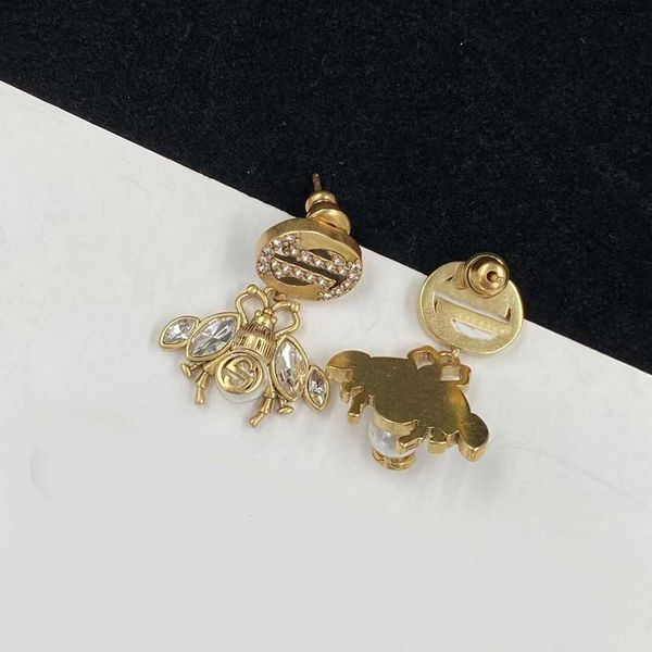 charm earrings fashion luxury brand designer classic rhinestone pearl bee personality internet celebrity pop earring high-end brand jewelry, Golden
charm earrings fashion luxury brand designer classic rhinestone pearl bee personality internet celebrity pop earring high-end brand jewelry, Golden