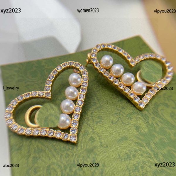 earrings designer for women heart shaped design jewelry pearl and diamond embellishments stud #including brand box new arrival, Golden;silver
earrings designer for women heart shaped design jewelry pearl and diamond embellishments stud #including brand box new arrival, Golden;silver