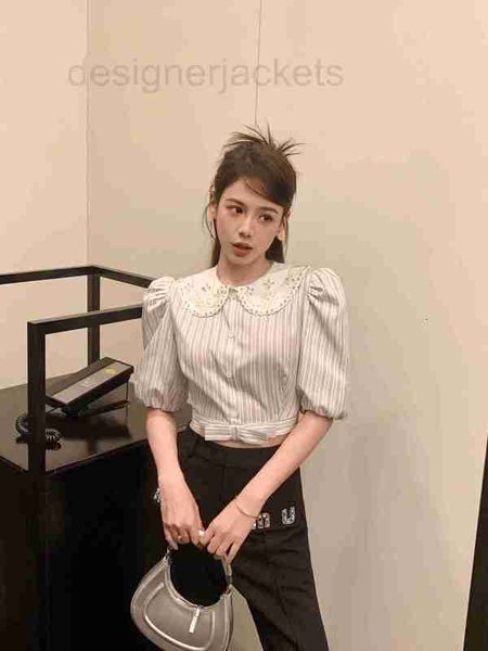women's blouses & shirts designer french short shirt 23 spring/summer new polo neck waist bow elastic cuff single breasted zob6, White
women's blouses & shirts designer french short shirt 23 spring/summer new polo neck waist bow elastic cuff single breasted zob6, White