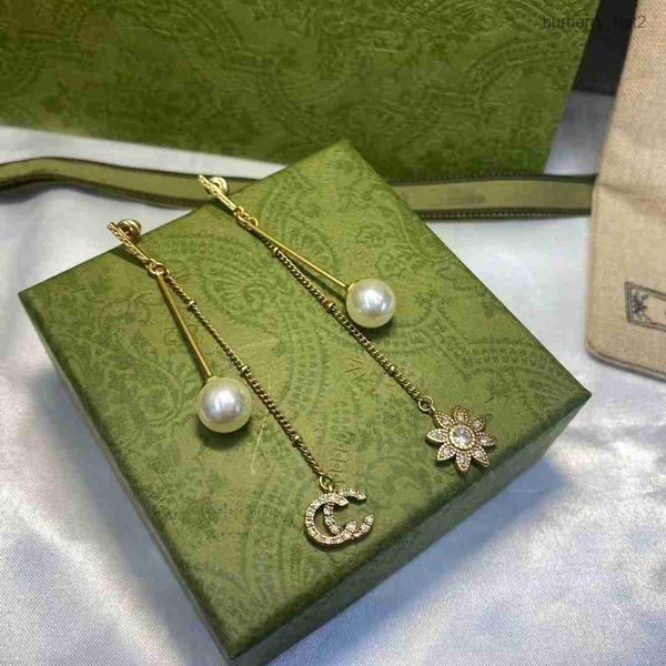 brand earrings designer for women fashion brand pearl rhinestone letter sun flower pendant female celebrity same style luxury earrings high-, Golden
brand earrings designer for women fashion brand pearl rhinestone letter sun flower pendant female celebrity same style luxury earrings high-, Golden