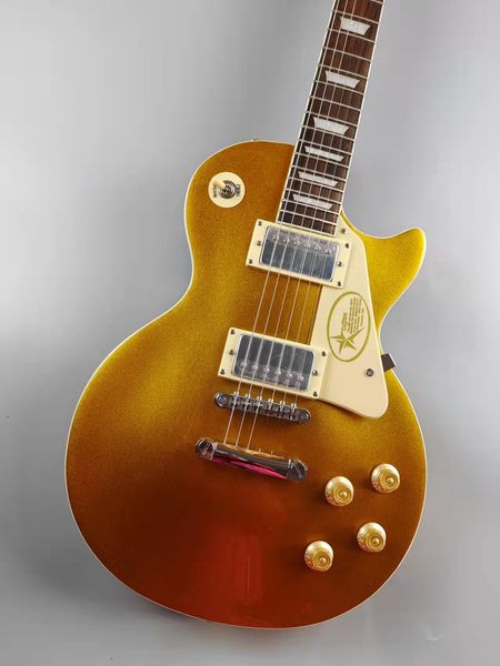 gold electric guitar with mahogany body, rose wood fingerboard, express transport, stock
gold electric guitar with mahogany body, rose wood fingerboard, express transport, stock