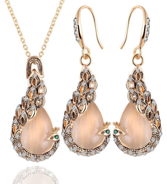 2pcsset natural opal pecock pendant statement crystal phoenix long earrings choker necklaces gold plated sets for women jewelry5688070, Silver
2pcsset natural opal pecock pendant statement crystal phoenix long earrings choker necklaces gold plated sets for women jewelry5688070, Silver