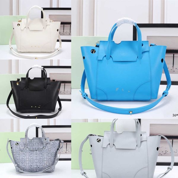 off bag women's tote with iconic hand iconic meter hollow out detail two round handles detachable shoulder strap built-in zipper pocket
off bag women's tote with iconic hand iconic meter hollow out detail two round handles detachable shoulder strap built-in zipper pocket
