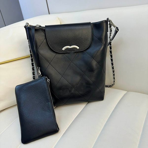 leather cowhide classic women large tote bag mini bucket retro crossbody designer bag clamshell silver hardware portable luxury handbag suit 
leather cowhide classic women large tote bag mini bucket retro crossbody designer bag clamshell silver hardware portable luxury handbag suit