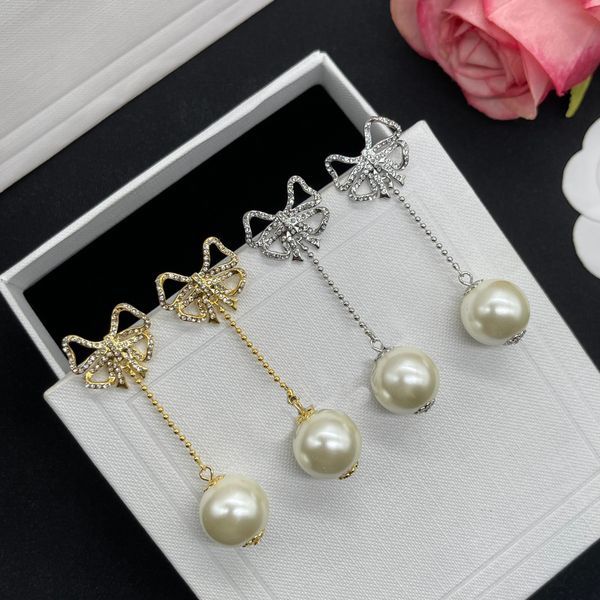 women fashion designer stud gold silver bowknot earrings white pearl simple style brass engagement long earring, Golden;silver
women fashion designer stud gold silver bowknot earrings white pearl simple style brass engagement long earring, Golden;silver
