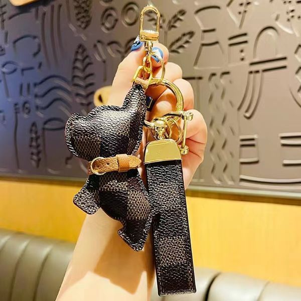 2023 luxury designer keychain with orange box men's waist buckle leather presbyopia keychain pendant car key chain ring fashion couple, Silver
2023 luxury designer keychain with orange box men's waist buckle leather presbyopia keychain pendant car key chain ring fashion couple, Silver