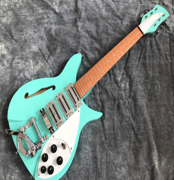 ricken 325 semi hollow body electric guitar short scale length 527 mm big tremolo tailpiece green4929113
ricken 325 semi hollow body electric guitar short scale length 527 mm big tremolo tailpiece green4929113