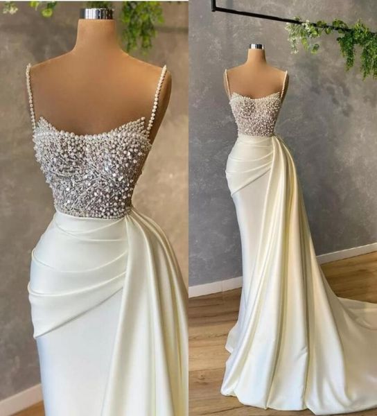 2022 luxury pearls spaghetti evening dress beading sequins ruched prom gowns satin sweep train mermaid party dresses b04247661207, Black;red
2022 luxury pearls spaghetti evening dress beading sequins ruched prom gowns satin sweep train mermaid party dresses b04247661207, Black;red