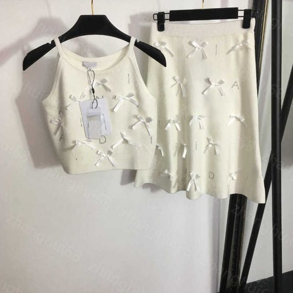 23ss womens designer clothing skirt set bow ironing drill letter knitted suspender vest high waist half skirt sets womens clothing a1, White
23ss womens designer clothing skirt set bow ironing drill letter knitted suspender vest high waist half skirt sets womens clothing a1, White