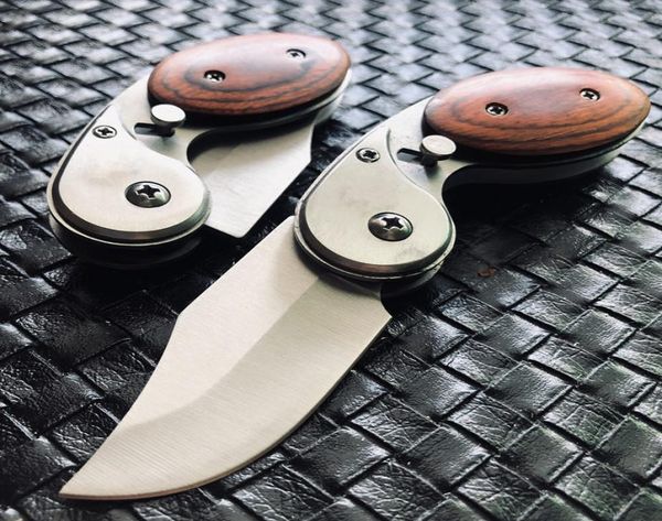 tactical folding knife defense knive 440c blade wood handle camping hunting survival edc tool7717692
tactical folding knife defense knive 440c blade wood handle camping hunting survival edc tool7717692