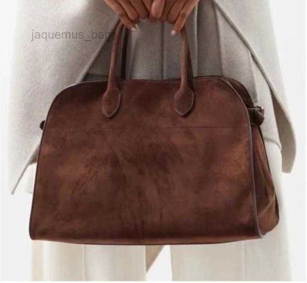 the row margaux 15 handbag high capacity bag cowhide tote travel bowling handbag purse
the row margaux 15 handbag high capacity bag cowhide tote travel bowling handbag purse