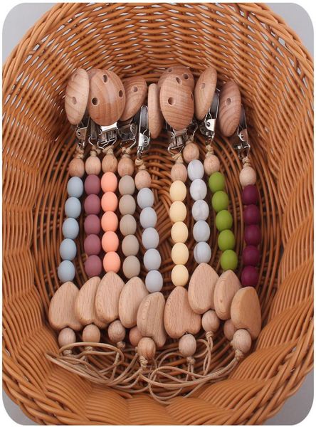 safety wooden teether baby infant toddler dummy pacifier silicone soother nipple clip chain holder strap baby chew toy for heart s5370294
safety wooden teether baby infant toddler dummy pacifier silicone soother nipple clip chain holder strap baby chew toy for heart s5370294