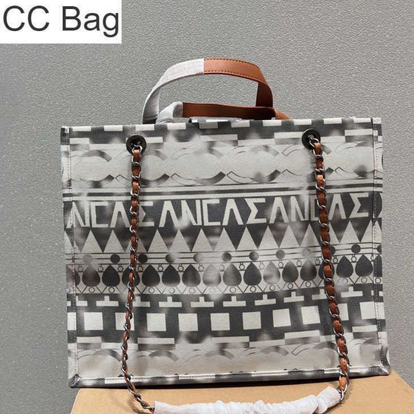 cc bag 9a womens tote bag original vintage canvas graffiti print shopping bag designer letter badge silver hardware chain brown leather hand, White
cc bag 9a womens tote bag original vintage canvas graffiti print shopping bag designer letter badge silver hardware chain brown leather hand, White