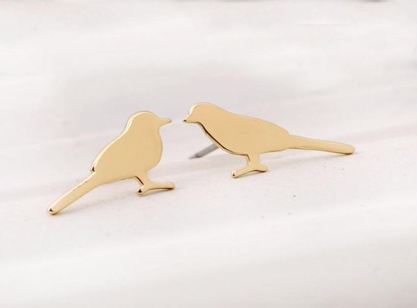 selling new glossy surface cute little bird sparrow earring silver gold rose gold color copper material for kids fashion jewel5181771, Golden;silver
selling new glossy surface cute little bird sparrow earring silver gold rose gold color copper material for kids fashion jewel5181771, Golden;silver