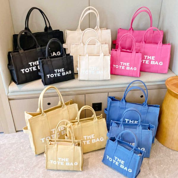 the tote bag casual canvas bag large capacity women handbags designer letter shoulder crossbody bags fashion luxury lapbag outdoor travel ba
the tote bag casual canvas bag large capacity women handbags designer letter shoulder crossbody bags fashion luxury lapbag outdoor travel ba