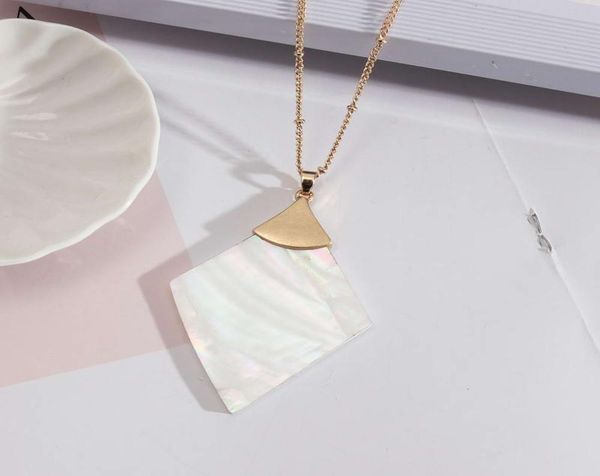 natural abalone shell quatrefoil pendant necklace with gold beads link chain white shell triangle long statement necklace jewelry6604439, Silver
natural abalone shell quatrefoil pendant necklace with gold beads link chain white shell triangle long statement necklace jewelry6604439, Silver