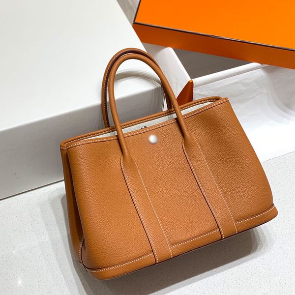 the worlds r cowhide garden bag 2023 new light luxury leather womens bag large capacity shopping bag tote bag crossbody handbag woman
the worlds r cowhide garden bag 2023 new light luxury leather womens bag large capacity shopping bag tote bag crossbody handbag woman