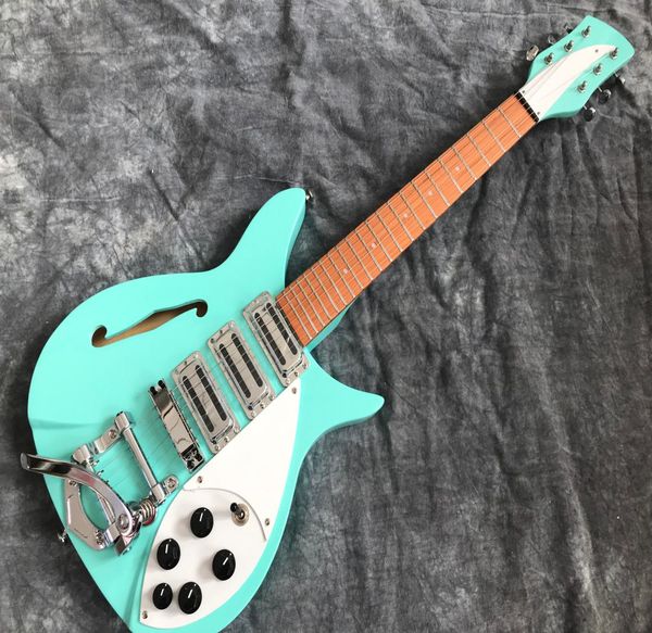 ricken 325 semi hollow body electric guitar short scale length 527 mm big tremolo tailpiece green8667497
ricken 325 semi hollow body electric guitar short scale length 527 mm big tremolo tailpiece green8667497