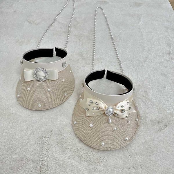 Designer golf cap brand Summer New 'Cross slung' Pearl Chain Hollow Top Sun Shield Hat for Women's Small Fragrant Wind High Grade Water Diamond super high quality, Bow
Designer golf cap brand Summer New 'Cross slung' Pearl Chain Hollow Top Sun Shield Hat for Women's Small Fragrant Wind High Grade Water Diamond super high quality, Bow