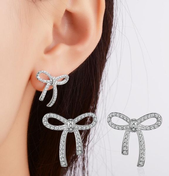 agood fashion jewelry accessories rose gold silver bowknot earrings stud for women female rhinestone wedding party7054093, Golden;silver
agood fashion jewelry accessories rose gold silver bowknot earrings stud for women female rhinestone wedding party7054093, Golden;silver