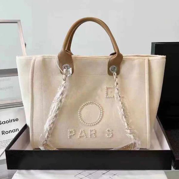 2023women luxury handbags designer beach bag fashion knitting shoulder large tote with chain canvas shopping bag purse
2023women luxury handbags designer beach bag fashion knitting shoulder large tote with chain canvas shopping bag purse