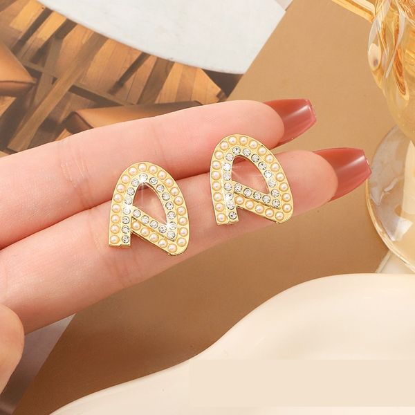 mixed simple 18k gold plated 925 silver luxury brand designers letters stud geometric famous women round crystal rhinestone pearl earring we, Golden
mixed simple 18k gold plated 925 silver luxury brand designers letters stud geometric famous women round crystal rhinestone pearl earring we, Golden