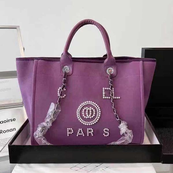 spring 2023 new embroidery logo fabric canvas stripe portable shopping bag beach bag one shoulder bun mother bag 03
spring 2023 new embroidery logo fabric canvas stripe portable shopping bag beach bag one shoulder bun mother bag 03