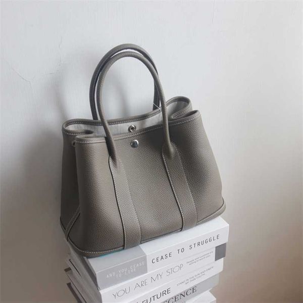 garden party handbag totes h family brand all season versatilecasual versatilecowhide portable on the first floor large capacityfull leather
garden party handbag totes h family brand all season versatilecasual versatilecowhide portable on the first floor large capacityfull leather