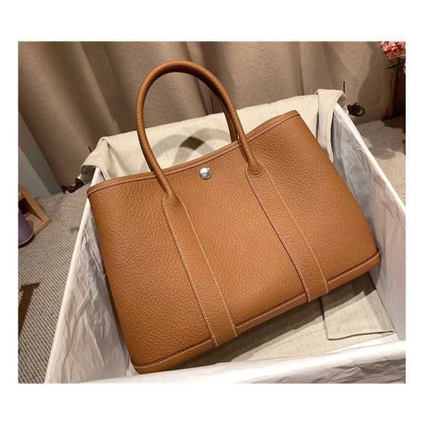 garden party handbag totes h family brand handmade thread togo cowhide womens shoulder crossbody handbag large capacity shopping trendwith
garden party handbag totes h family brand handmade thread togo cowhide womens shoulder crossbody handbag large capacity shopping trendwith