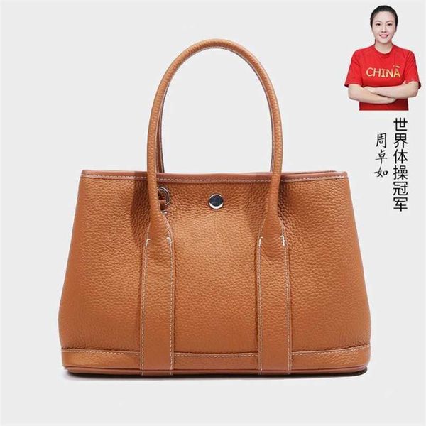 garden party handbag totes h family brand the version of cowhide on the first floor is simple fashionable large capacity leather shoulder wo
garden party handbag totes h family brand the version of cowhide on the first floor is simple fashionable large capacity leather shoulder wo