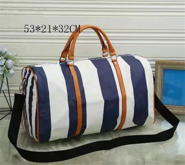 duffel bags luxury fashion men women travel duffle bags brand designer luggage handbags with lock large capacity sport bag size 55cm 
duffel bags luxury fashion men women travel duffle bags brand designer luggage handbags with lock large capacity sport bag size 55cm