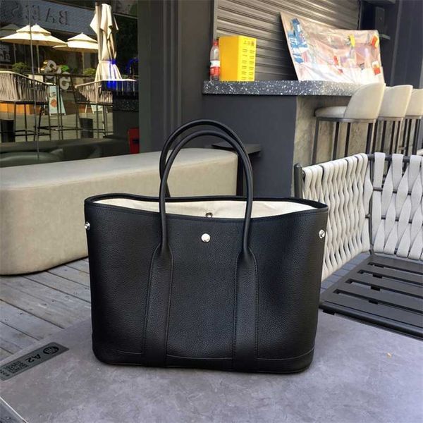 garden party handbag totes h family brand autumn winter togo layer cowhide senior sensitive women's large-capacity leather handbagwith
garden party handbag totes h family brand autumn winter togo layer cowhide senior sensitive women's large-capacity leather handbagwith