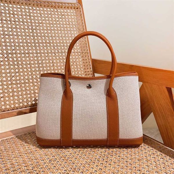 garden party handbag totes h family brand genuine leather womens shoulder crossbody cowhide canvas handbag large capacity color matching ver
garden party handbag totes h family brand genuine leather womens shoulder crossbody cowhide canvas handbag large capacity color matching ver