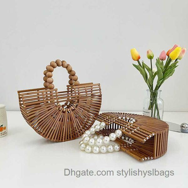 shoulder bags handmade bamboo handbag pearl handle design women hollow out beach bag summer vacation woven straw bag female bag
shoulder bags handmade bamboo handbag pearl handle design women hollow out beach bag summer vacation woven straw bag female bag