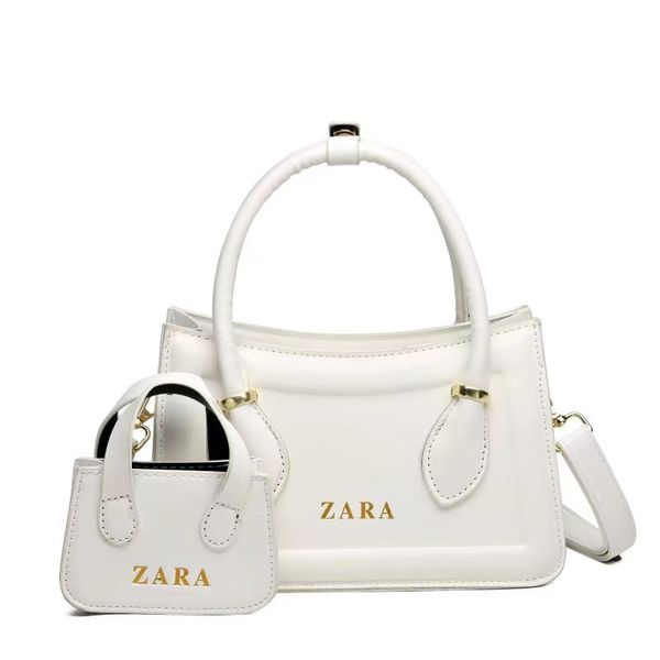 new european and american set mother and child handbag small square bag candy color single shoulder crossbody bag workmanship fine factory d
new european and american set mother and child handbag small square bag candy color single shoulder crossbody bag workmanship fine factory d