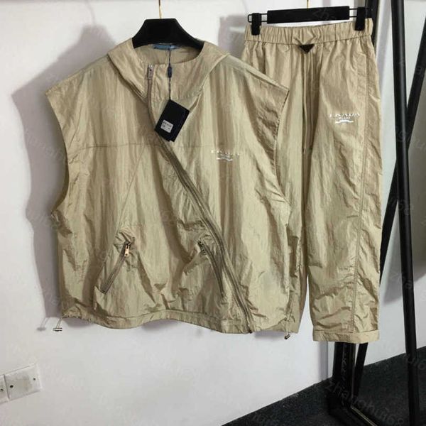 23ss windbreaker set womens designer clothing women tracksuit sleeveless hooded waistcoat letter triangle label elastic waist casual pants s, Gray
23ss windbreaker set womens designer clothing women tracksuit sleeveless hooded waistcoat letter triangle label elastic waist casual pants s, Gray