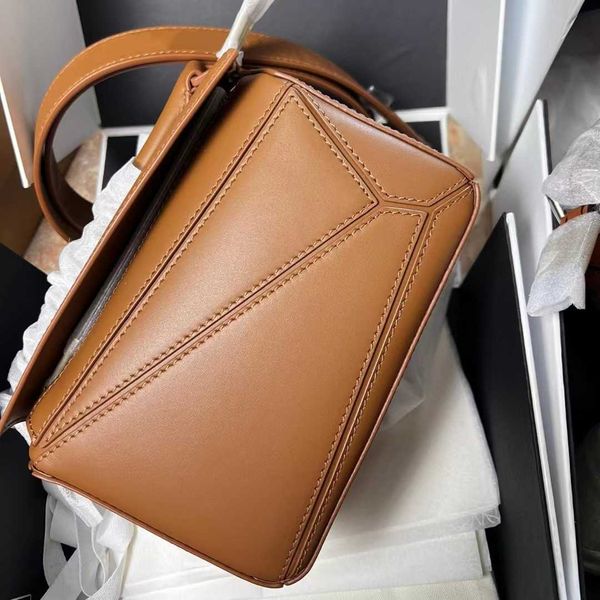 original colored leather pillow bag puzzle geometric saddle difference classic handbag
original colored leather pillow bag puzzle geometric saddle difference classic handbag