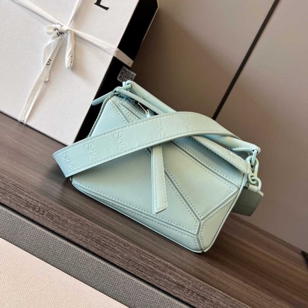 yiwei's new wide shoulder strap puzzle satin calfskin geometric bag crossbody bag single shoulder handbag high quality
yiwei's new wide shoulder strap puzzle satin calfskin geometric bag crossbody bag single shoulder handbag high quality