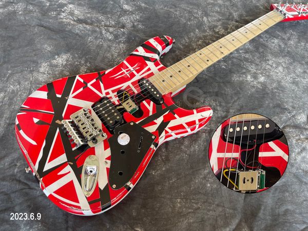 electric guitar relic stripes black whie and red background ssh pickups chrome parts maple neck and fingerboard
electric guitar relic stripes black whie and red background ssh pickups chrome parts maple neck and fingerboard