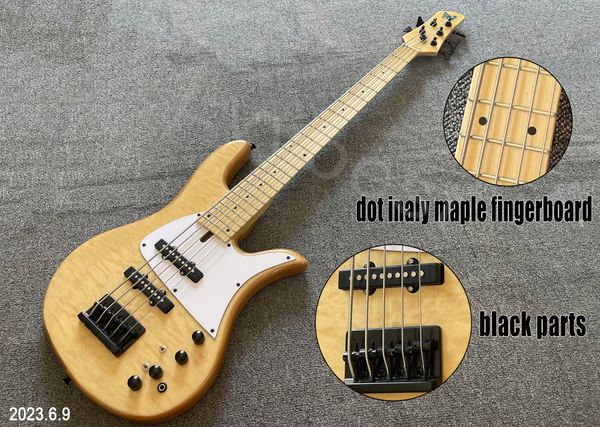 5 string electric bass guitar natural color high glossy quilt flame and back maple neck and fingerboard
5 string electric bass guitar natural color high glossy quilt flame and back maple neck and fingerboard