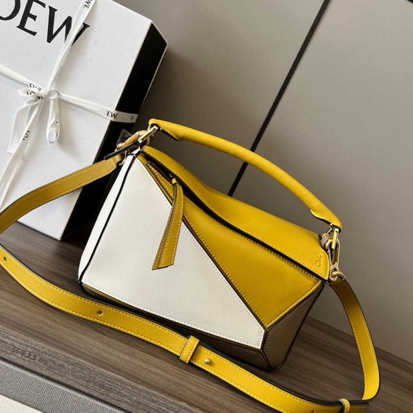 new puzzle small calf leather colored skew straddle handheld bag single shoulder high quality
new puzzle small calf leather colored skew straddle handheld bag single shoulder high quality