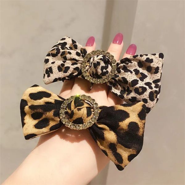 autumn and winter new round buckle drill bow leopard circle czech diamond boutique quality leather band rope, Black;brown
autumn and winter new round buckle drill bow leopard circle czech diamond boutique quality leather band rope, Black;brown
